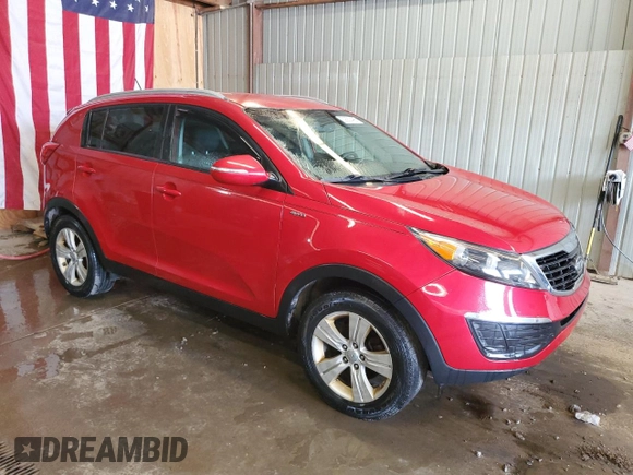 2012 Kia Sportage LX with VIN KNDPBCA2XC7221238, listed as a Copart auction lot 53683495 with 217,313 mi miles and Salvage Title. Bid and sale history available at DreamBid. Image 4.