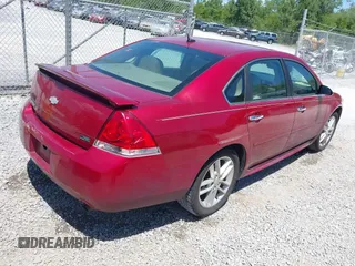 2013 Chevrolet Impala LTZ with VIN 2G1WC5E35D1175879, listed as a IAAI auction lot 42143602 with 156,385 mi miles and . Bid and sale history available at DreamBid. Image 4.