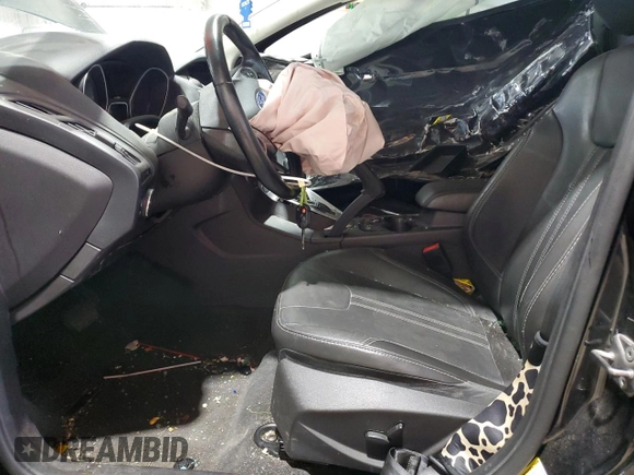 2013 Ford Focus SE with VIN 1FADP3F21DL348827, listed as a Copart auction lot 63589405 with 144,156 mi miles and Salvage title. Bid and sale history available at DreamBid. Image 7.