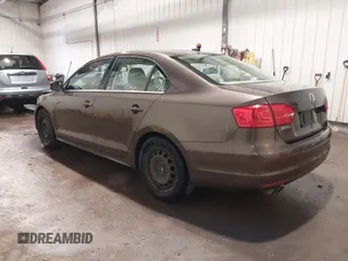2014 Volkswagen Jetta TDI w/Premium with VIN 3VWLL7AJ1EM358214, listed as a IAAI auction lot 42148435 with 174,923 mi miles and . Bid and sale history available at DreamBid. Image 3.