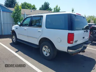 1997 Ford Expedition XLT z VIN 1FMFU18L3VLA65297, wystawiony jako IAAI lot #42418325 z przebiegiem 266 297 mil mil oraz . Historia ofert i sprzedaży dostępna na DreamBid. Obrazek 3.