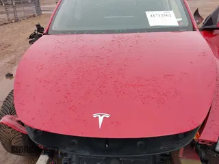 2021 Tesla Model Y Long Range with VIN 5YJYGDEE3MF204941, listed as a IAAI auction lot 41712562 with 36,549 mi miles. Bid and sale history available at carsss.com. Image 10.