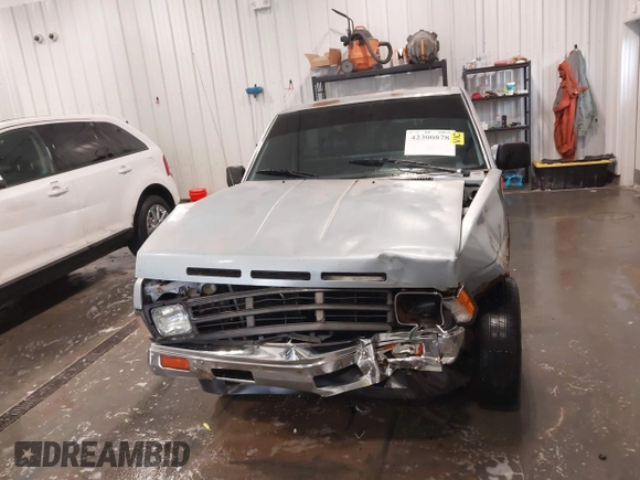 1990 Nissan Frontier with VIN 1N6SD11S7LC401368, listed as a IAAI auction lot 42300878 with 169,592 mi miles and . Bid and sale history available at DreamBid. Image 12.