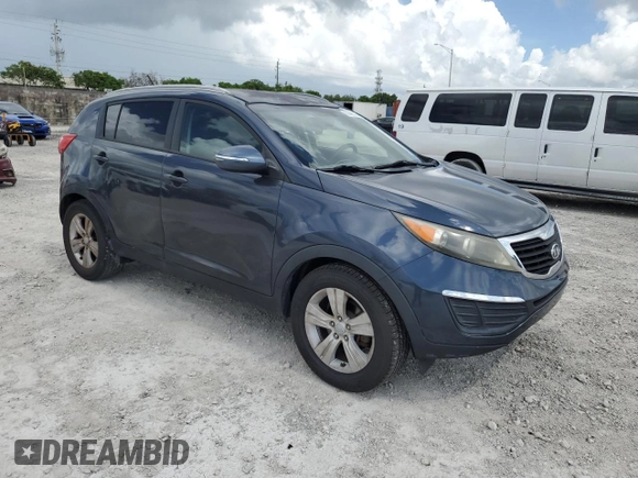 2012 Kia Sportage LX z VIN KNDPB3A29C7240993, wystawiony jako Copart lot #61408165 z przebiegiem 171 453 mil mil oraz Czysty tytuł • Clean title. Historia ofert i sprzedaży dostępna na DreamBid. Obrazek 4.