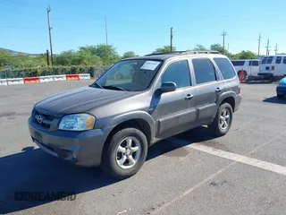 2006 Mazda Tribute S with VIN 4F2CZ04196KM12520, listed as a IAAI auction lot 41872221 with Not Provided miles and . Bid and sale history available at carsss.com. Image 2.