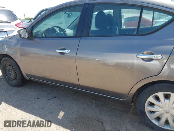 2016 Nissan Versa SV with VIN 3N1CN7AP3GL869789, listed as a IAAI auction lot 41997640 with 208,817 mi miles and . Bid and sale history available at DreamBid. Image 15.