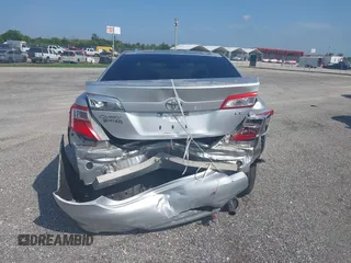 2012 Toyota Camry L z VIN 4T1BF1FK7CU001984, wystawiony jako IAAI lot #41585144 z przebiegiem 20 585 mil mil oraz . Historia ofert i sprzedaży dostępna na DreamBid. Obrazek 6.