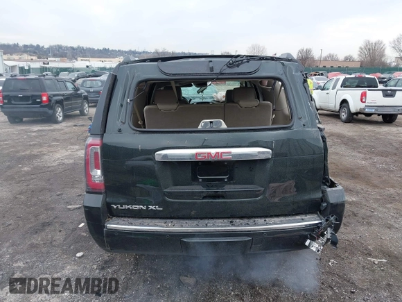 2016 GMC Yukon XL Denali with VIN 1GKS2HKJ8GR406450, listed as a IAAI auction lot 41661050 with 125,830 mi miles. Bid and sale history available at carsss.com. Image 17.