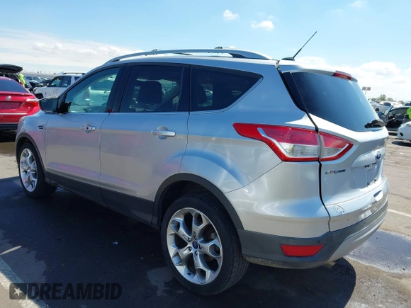 2013 Ford Escape Titanium z VIN 1FMCU0J94DUD84163, wystawiony jako IAAI lot #42406932 z przebiegiem 111 258 mil mil oraz . Historia ofert i sprzedaży dostępna na DreamBid. Obrazek 3.