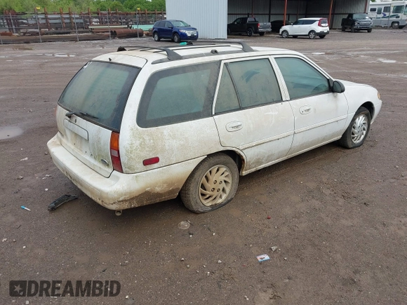 1999 Ford Escort SE with VIN 3FAFP15PXXR161344, listed as a IAAI auction lot 42116579 with 146,706 mi miles. Bid and sale history available at carsss.com. Image 4.