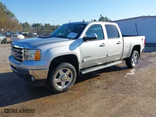 2013 GMC Sierra 2500HD SLT with VIN 1GT121C82DF218580, listed as a IAAI auction lot 41758693 with 121,798 mi miles. Bid and sale history available at carsss.com. Image 2.