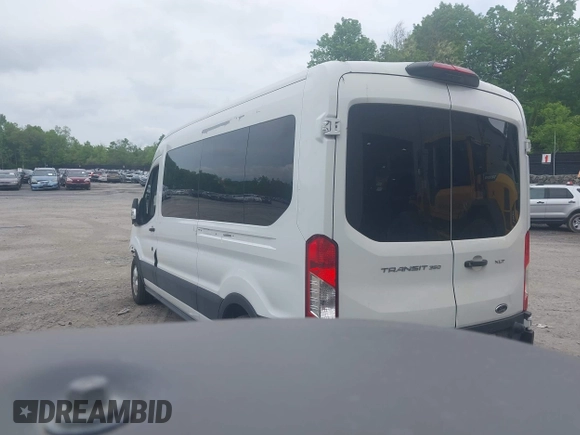 2020 Ford Transit Passenger XL z VIN 1FBAX2CG9LKA95093, wystawiony jako IAAI lot #42292375 z przebiegiem 53 912 mil mil oraz . Historia ofert i sprzedaży dostępna na DreamBid. Obrazek 3.