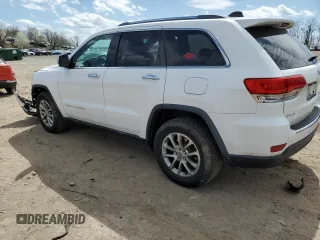 2015 Jeep Grand Cherokee Limited with VIN 1C4RJFBG2FC804034, listed as a Copart auction lot 50902885 with 214,544 mi miles and Salvage Title. Bid and sale history available at carsss.com. Image 2.