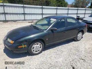 2002 Saturn SL z VIN 1G8ZK52732Z230147, wystawiony jako Copart lot #57053055 z przebiegiem 168 612 mil mil oraz Czysty tytuł • Clean title. Historia ofert i sprzedaży dostępna na DreamBid. Obrazek 1.