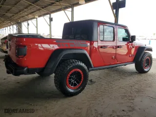 2022 Jeep Gladiator Rubicon with VIN 1C6JJTBG1NL105673, listed as a Copart auction lot 47828125 with 31,835 mi miles and Salvage Title. Bid and sale history available at carsss.com. Image 3.