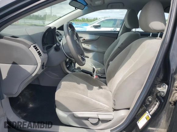2010 Toyota Corolla z VIN 2T1BU4EE9AC498876, wystawiony jako Copart lot #60984755 z przebiegiem 198 095 mil mil oraz Szkoda całkowita • Salvage title. Historia ofert i sprzedaży dostępna na DreamBid. Obrazek 7.