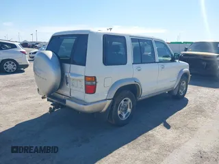 1998 Isuzu Trooper S with VIN JACDJ58X0W7913434, listed as a IAAI auction lot 41690061 with 208,306 mi miles and . Bid and sale history available at DreamBid. Image 4.