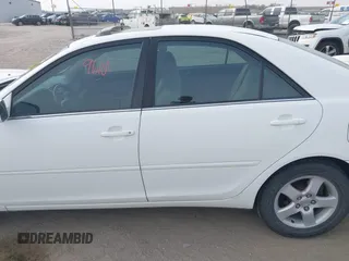 2003 Toyota Camry LE with VIN 4T1BE32K13U250477, listed as a IAAI auction lot 41996101 with 212,951 mi miles and . Bid and sale history available at DreamBid. Image 14.