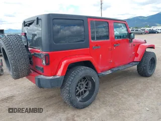 2018 Jeep Wrangler JK Unlimited Sahara with VIN 1C4HJWEG3JL893970, listed as a IAAI auction lot 39530074 with 72,079 mi miles. Bid and sale history available at carsss.com. Image 4.