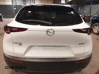 2024 Mazda CX-30 S Carbon Edition z VIN 3MVDMBCM4RM657165, wystawiony jako IAAI lot #42297738 z przebiegiem 7 041 mil mil oraz . Historia ofert i sprzedaży dostępna na DreamBid. Obrazek 17.