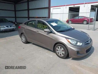 2013 Hyundai Accent GLS with VIN KMHCT4AE1DU358871, listed as a IAAI auction lot 42373080 with 150,443 mi miles and . Bid and sale history available at DreamBid. Image 1.