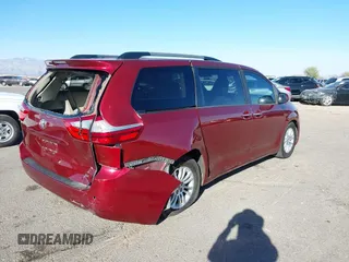 2015 Toyota Sienna XLE with VIN 5TDYK3DCXFS621190, listed as a IAAI auction lot 41646481 with 173,817 mi miles. Bid and sale history available at carsss.com. Image 4.