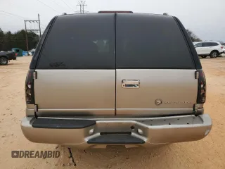 2000 Cadillac Escalade z VIN 1GYEK63R9YR218680, wystawiony jako Copart lot #87393204 z przebiegiem 295 494 mil mil oraz Szkoda całkowita • Salvage title. Historia ofert i sprzedaży dostępna na DreamBid. Obrazek 6.