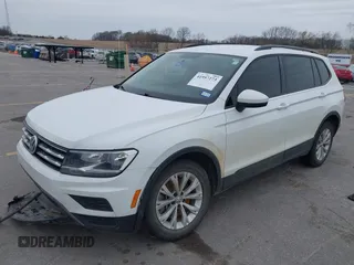 2020 Volkswagen Tiguan S with VIN 3VV1B7AX5LM079123, listed as a IAAI auction lot 41957273 with 89,449 mi miles and . Bid and sale history available at DreamBid. Image 2.