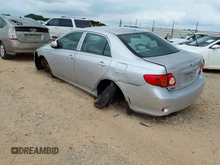 2009 Toyota Corolla with VIN 1NXBU40E49Z086415, listed as a IAAI auction lot 39773955 with 203,803 mi miles and . Bid and sale history available at DreamBid. Image 3.