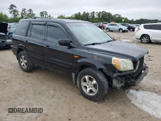 2006 Honda Pilot EX-L with VIN 5FNYF28516B003593, listed as a Copart auction lot 53879665 with 153,264 mi miles and Salvage Title. Bid and sale history available at DreamBid. Image 4.
