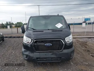 2022 Ford Transit z VIN 1FTYE2Y88NKA08465, wystawiony jako IAAI lot #42387552 z przebiegiem 90 951 mil mil oraz . Historia ofert i sprzedaży dostępna na DreamBid. Obrazek 12.