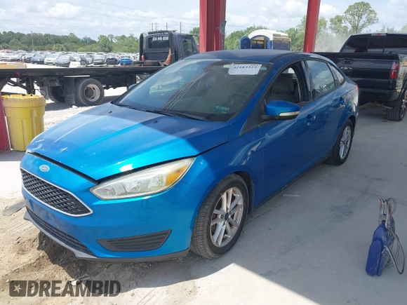 2015 Ford Focus SE with VIN 1FADP3F2XFL354354, listed as a IAAI auction lot 42183319 with 102,232 mi miles and . Bid and sale history available at carsss.com. Image 2.