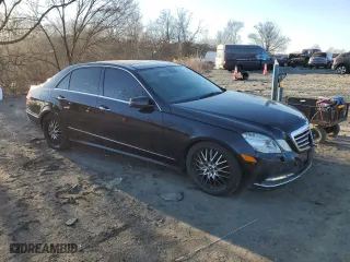 2011 Mercedes-Benz E-Class E 550 Luxury with VIN WDDHF9AB2BA264183, listed as a Copart auction lot 46336995 with 184,659 mi miles and Salvage Title. Bid and sale history available at carsss.com. Image 4.