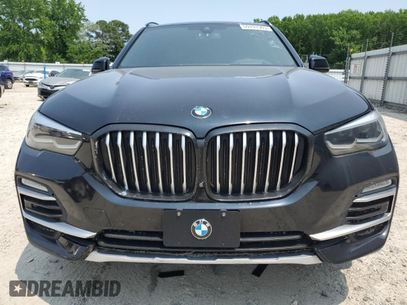 2020 BMW X5 sDrive40i with VIN 5UXCR4C01L9C26104, listed as a Copart auction lot 59191565 with 62,852 mi miles and Clean title. Bid and sale history available at DreamBid. Image 5.