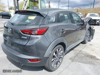 2019 Mazda CX-3 Grand Touring with VIN JM1DKDD71K1445905, listed as a IAAI auction lot 41674243 with 64,949 mi miles. Bid and sale history available at carsss.com. Image 4.