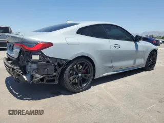 2022 BMW 4 Series 430i with VIN WBA53AP03NCJ59994, listed as a Copart auction lot 63267865 with 33,328 mi miles and Salvage title. Bid and sale history available at DreamBid. Image 3.