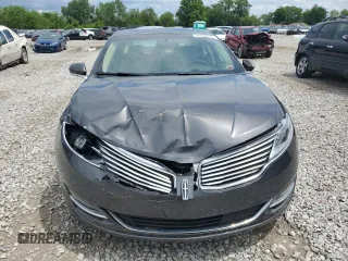 2016 Lincoln MKZ Hybrid with VIN 3LN6L2LU5GR634521, listed as a Copart auction lot 56939735 with 215,718 mi miles and Salvage title. Bid and sale history available at DreamBid. Image 5.