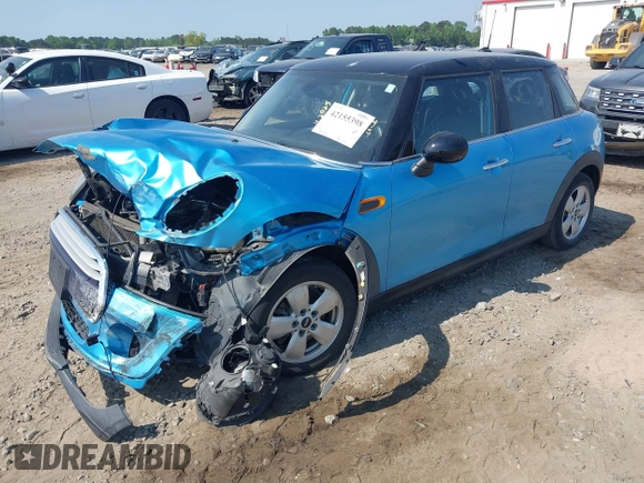 2015 MINI Hardtop 4 Door with VIN WMWXS5C56FT831505, listed as a IAAI auction lot 42155398 with 95,693 mi miles and . Bid and sale history available at DreamBid. Image 22.