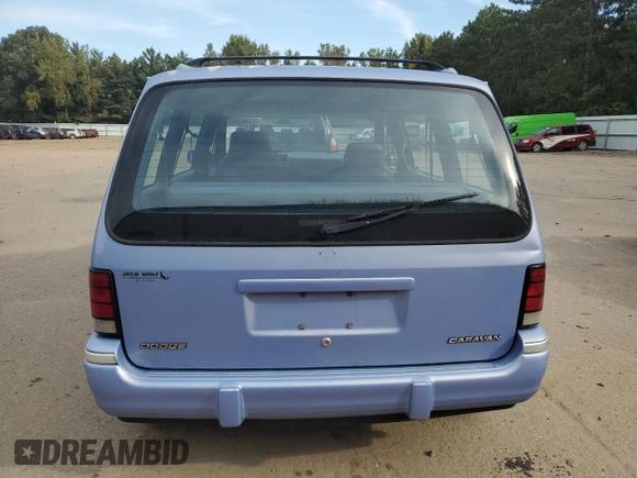 1993 Dodge Caravan z VIN 2B4GH2533PR287787, wystawiony jako Copart lot #71940684 z przebiegiem 107 939 mil mil oraz Szkoda całkowita • Salvage title. Historia ofert i sprzedaży dostępna na DreamBid. Obrazek 6.