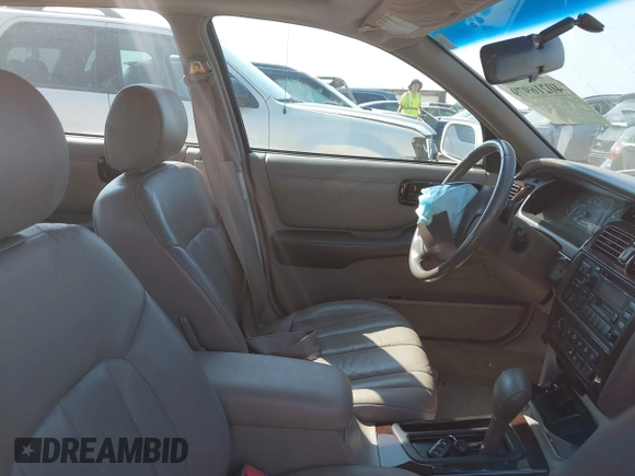 1998 Toyota Avalon XL with VIN 4T1BF18B8WU263045, listed as a IAAI auction lot 40216979 with 150,592 mi miles and . Bid and sale history available at DreamBid. Image 5.