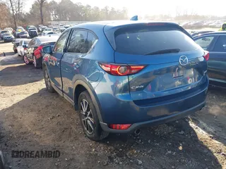 2018 Mazda CX-5 Grand Touring with VIN JM3KFADM9J1328501, listed as a IAAI auction lot 41408154 with 116,679 mi miles. Bid and sale history available at carsss.com. Image 3.