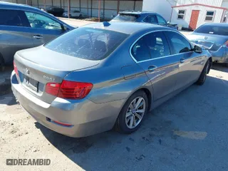 2014 BMW 5 Series 528i with VIN WBA5A5C58ED506079, listed as a IAAI auction lot 41236765 with 157,283 mi miles. Bid and sale history available at carsss.com. Image 4.
