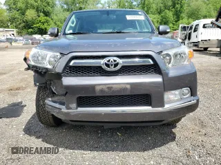 2011 Toyota 4Runner Trail with VIN JTEBU5JR4B5041806, listed as a Copart auction lot 55930015 with 149,697 mi miles and Salvage title. Bid and sale history available at DreamBid. Image 5.
