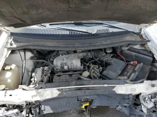 1998 Ford Windstar z VIN 2FTDA54U5WBB50718, wystawiony jako Copart lot #68932174 z przebiegiem 57 879 mil mil oraz Tytuł czysty. Historia ofert i sprzedaży dostępna na DreamBid. Obrazek 11.