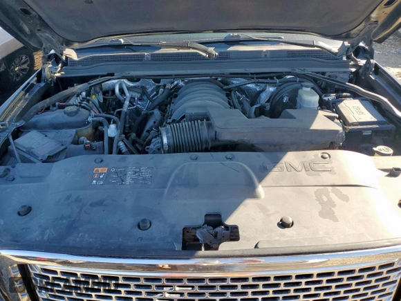 2015 GMC Yukon Denali with VIN 1GKS2CKJ2FR580533, listed as a Copart auction lot 48455205 with 147,532 mi miles and Salvage Title. Bid and sale history available at carsss.com. Image 12.