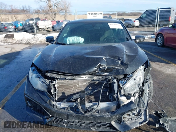 2019 Honda Civic Si with VIN 2HGFC3A52KH751629, listed as a IAAI auction lot 41644966 with 81,580 mi miles and . Bid and sale history available at DreamBid. Image 12.
