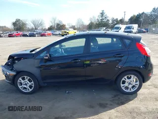 2016 Ford Fiesta SE with VIN 3FADP4EJ5GM153945, listed as a IAAI auction lot 41829241 with 157,597 mi miles. Bid and sale history available at carsss.com. Image 14.