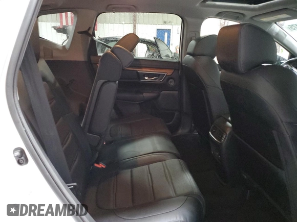 2021 Honda CR-V Touring z VIN 5J6RW2H96ML015699, wystawiony jako Copart lot #60616475 z przebiegiem 46 297 mil mil oraz Szkoda całkowita • Salvage title. Historia ofert i sprzedaży dostępna na DreamBid. Obrazek 11.