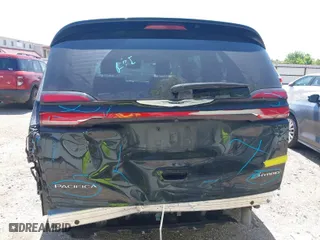 2023 Chrysler Pacifica Hybrid Limited with VIN 2C4RC1S73PR588684, listed as a IAAI auction lot 42009317 with 45,372 mi miles. Bid and sale history available at carsss.com. Image 6.