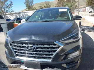 2021 Hyundai Tucson Limited with VIN KM8J33AL6MU298151, listed as a IAAI auction lot 41637599 with 73,886 mi miles. Bid and sale history available at carsss.com. Image 13.